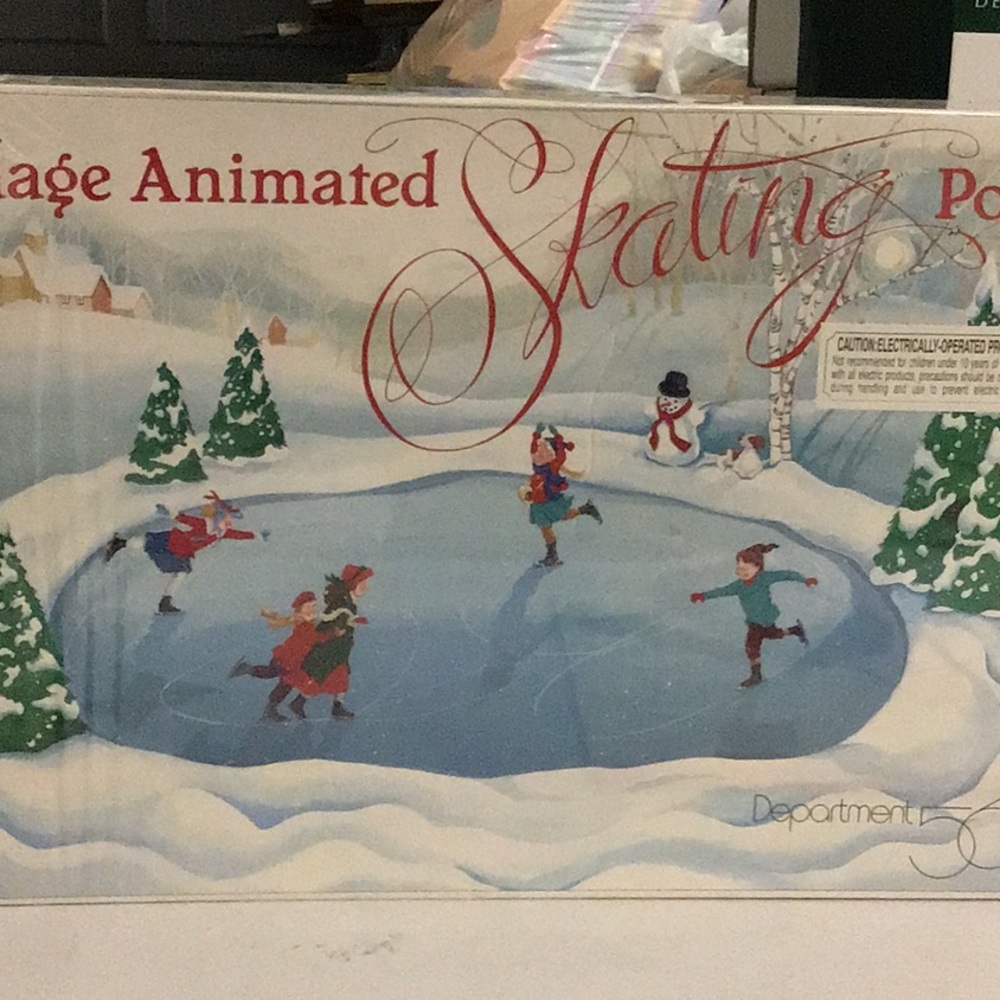 Department 56 village animated skating pond